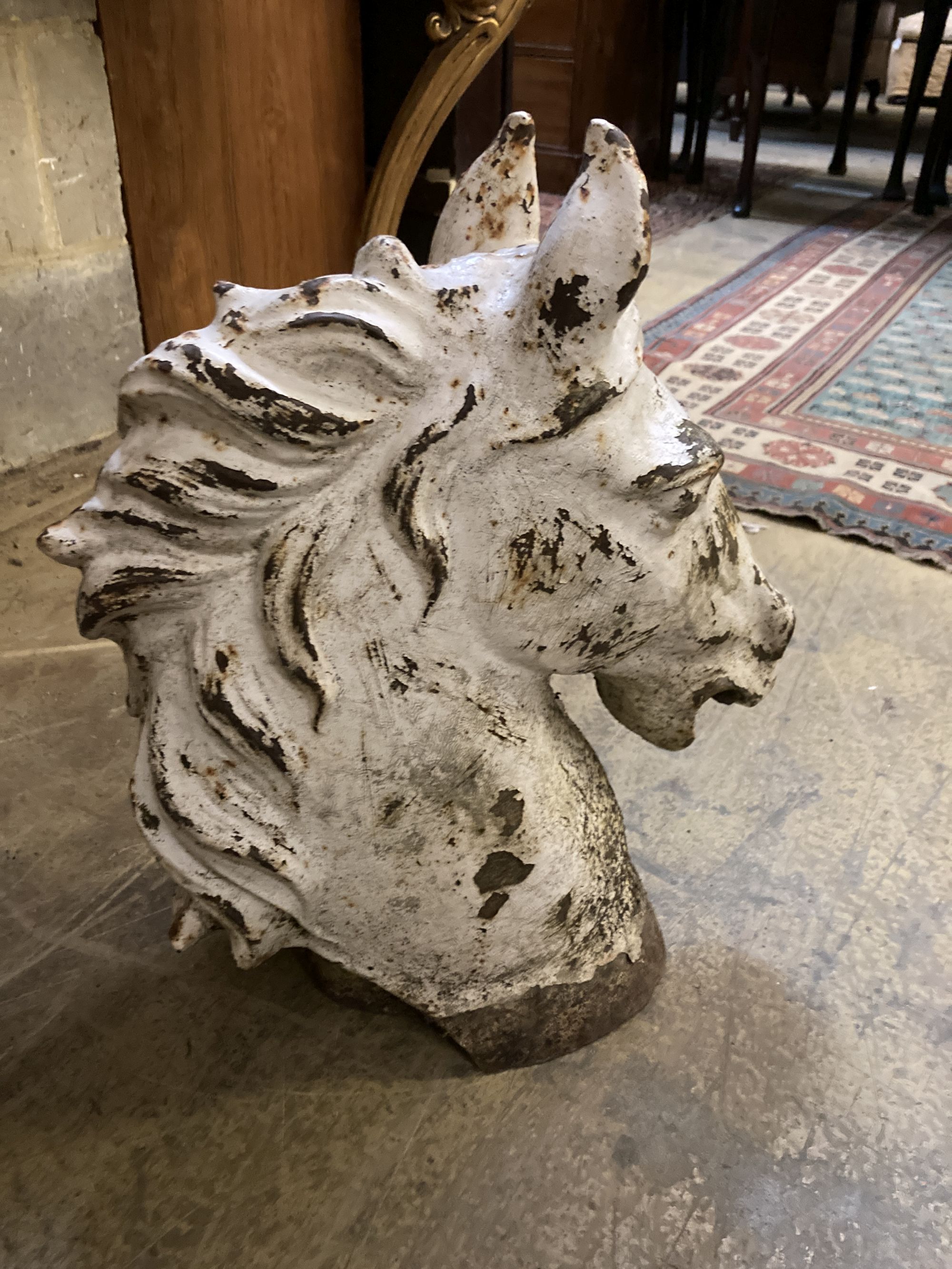 A cast iron horse head tethering post capitol, height 49cm